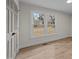 A spacious bedroom with ample natural light and a neutral color palette, creating a calm and inviting atmosphere at 2108 Rangecrest Rd, Raleigh, NC 27612
