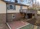 Two-story house featuring a brick foundation, bay window, and an elevated deck at 2108 Rangecrest Rd, Raleigh, NC 27612