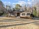 Charming single-story home featuring a well-manicured lawn and mature trees, and neutral paint scheme at 2108 Rangecrest Rd, Raleigh, NC 27612