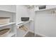 A walk-in closet with custom shelving, providing ample storage space for clothing and accessories at 2115 Port Royal Rd, Raleigh, NC 27609