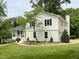 Beautiful two-story home featuring a landscaped front yard with walkway and an attached two-car garage at 2115 Port Royal Rd, Raleigh, NC 27609