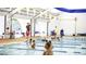 Community indoor swimming pool with swimmers, instructors, and ample seating at 2115 Port Royal Rd, Raleigh, NC 27609