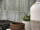 Close-up of the kitchen backsplash and stove, adding texture and style to the space at 2115 Port Royal Rd, Raleigh, NC 27609