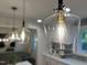Kitchen features pendant lights offering a modern and stylish look at 2115 Port Royal Rd, Raleigh, NC 27609