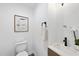 Modern powder room with a sleek vanity and stylish decor at 2115 Port Royal Rd, Raleigh, NC 27609