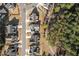 Aerial view of a well-planned community with lush greenery, walking trails, and manicured lawns at 2128 Arborwood Dr, Durham, NC 27705