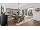 Bright breakfast room with a round table, wicker chairs, and access to the outdoor patio, perfect for entertaining at 2128 Arborwood Dr, Durham, NC 27705