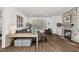 Comfortable living room featuring a stone fireplace, plush seating, and lots of natural light, perfect for relaxation at 2128 Arborwood Dr, Durham, NC 27705
