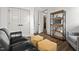 Spacious living room featuring a media console, comfy furniture and hardwood floors at 2128 Arborwood Dr, Durham, NC 27705