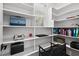 Office area with built-in shelving, offering ample storage and workspace at 2128 Arborwood Dr, Durham, NC 27705