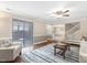 Spacious living area with connecting rooms, sliding glass door and plush seating at 228 Finley Forest Dr, Chapel Hill, NC 27517