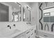 Modern bathroom featuring dual sinks, sleek fixtures, and elegant design, creating a spa-like retreat at 228 Woodsborough Pl, Raleigh, NC 27601
