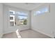Bright bedroom features beautiful hardwood floors and two windows letting in plenty of natural light at 228 Woodsborough Pl, Raleigh, NC 27601