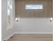 Bright bedroom features an accent wall and large window letting in plenty of light at 228 Woodsborough Pl, Raleigh, NC 27601