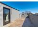 Outdoor deck featuring stylish wood tile flooring and a glass door at 228 Woodsborough Pl, Raleigh, NC 27601