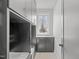 Well-organized mud room featuring storage cabinets, drawers, and bench at 228 Woodsborough Pl, Raleigh, NC 27601