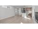 Bright open floor plan with a fireplace, flowing seamlessly to the modern kitchen and dining areas at 228 Woodsborough Pl, Raleigh, NC 27601