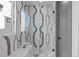 Luxurious glass-enclosed shower with custom tile work and modern fixtures, creating a spa-like experience at 228 Woodsborough Pl, Raleigh, NC 27601