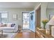 Bright entryway featuring hardwood floors, stylish furnishings, and a clear view of the outdoors at 2618 Elgin St, Durham, NC 27704