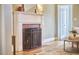 Classic fireplace with brick surround and white mantle at 2618 Elgin St, Durham, NC 27704