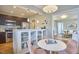 Contemporary kitchen featuring stainless steel appliances and seamless connection to living room at 2618 Elgin St, Durham, NC 27704