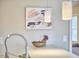 Stylish kitchen with modern lighting, neutral tones, and a view of the living area at 2618 Elgin St, Durham, NC 27704