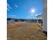 Backyard view featuring a covered patio and neighboring homes at 265 Forest Meadow Ln, Franklinton, NC 27525