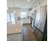 Contemporary kitchen featuring stainless steel appliances, granite countertops, and a large island at 265 Forest Meadow Ln, Franklinton, NC 27525