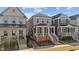 Attractive new construction home with a welcoming front porch, complementing the modern design and landscaping at 283 Dry Canyon Dr, Wendell, NC 27591