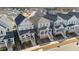 Charming new construction homes featuring inviting front porches and modern design elements in a Gathering-friendly neighborhood at 283 Dry Canyon Dr, Wendell, NC 27591