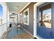Cozy front porch with comfortable seating, charming rug, and a view of the neighborhood at 283 Dry Canyon Dr, Wendell, NC 27591