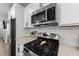 Close up of a modern kitchen showcasing stainless steel appliances at 283 Dry Canyon Dr, Wendell, NC 27591