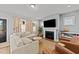Cozy living room featuring a fireplace, built-in shelving, and plush seating for a relaxed atmosphere at 283 Dry Canyon Dr, Wendell, NC 27591