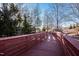 A wooden walkway meanders through a wooded area and green space at 283 Dry Canyon Dr, Wendell, NC 27591