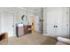 Bedroom with a view of a storage unit and view to the front door at 2920 Claremont Rd, Raleigh, NC 27608