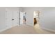 Bedroom with carpeting featuring an attached bathroom and closet at 2920 Claremont Rd, Raleigh, NC 27608