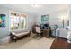 Bright home office with a large window, desk setup, and ample natural light at 2920 Claremont Rd, Raleigh, NC 27608