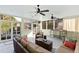 Sunroom showcasing slate floors, ceiling fans, and plenty of natural light at 2920 Claremont Rd, Raleigh, NC 27608