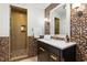 Bathroom showcasing a shower with mosaic tile and an undermount sink at 3021 Allenby Dr, Raleigh, NC 27604