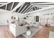 Spacious and bright open living area with high ceilings, hardwood floors and modern decor at 3021 Allenby Dr, Raleigh, NC 27604