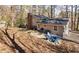 Backyard features patio with outdoor seating area and a grill, perfect for entertaining at 330 Wesley Dr, Chapel Hill, NC 27516