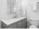 Bathroom features a white sink and a medicine cabinet and white tile shower at 330 Wesley Dr, Chapel Hill, NC 27516