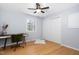 Bedroom with ceiling fan, hardwood flooring, closet, and window with natural light at 330 Wesley Dr, Chapel Hill, NC 27516