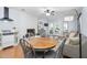 Inviting living room with a fireplace, ceiling fan, and access to the outdoors at 330 Wesley Dr, Chapel Hill, NC 27516