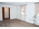 Bright bedroom featuring neutral carpet, light walls, and two windows with soft curtains at 3359 Huffines Dr, Burlington, NC 27217