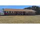 Charming ranch-style home with a brick exterior and classic white shutters at 3359 Huffines Dr, Burlington, NC 27217