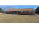 Single story brick home with a large front lawn at 3359 Huffines Dr, Burlington, NC 27217