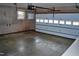 Empty garage interior with open overhead door at 3359 Huffines Dr, Burlington, NC 27217