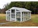 A small stand-alone greenhouse sits on the side of the property at 3359 Huffines Dr, Burlington, NC 27217