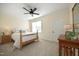 Bedroom with ceiling fan, natural light, neutral color palette and carpet at 3937 Bentley Brook Dr, Raleigh, NC 27612